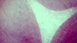 shemale self-masturbates with a marker in solo scene