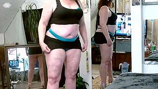 Curvy redhead Dawn flaunts thick body and talks dirty in steamy solo clip.