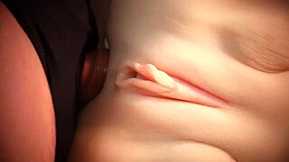 Curvy blonde mistress moans from big strapon orgasm.