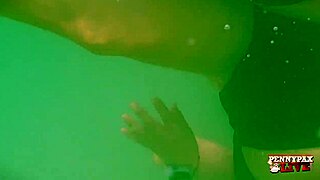 Penny Pax gets super horny masturbating underwater, ripping clothes
