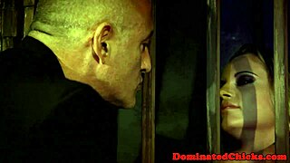 The caged sub beauty gets roughly fucked from behind in doggystyle