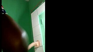 Ebony gymnast mounts wall dildo