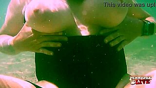 Penny Pax gets super horny masturbating underwater, ripping clothes