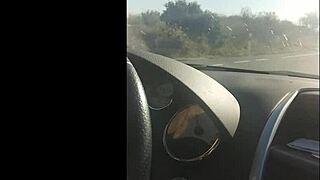 Watch this steamy handjob happening in the car.