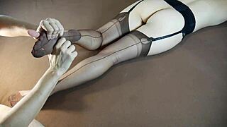 a horny milf gets a soles massage while wearing stockings, with tickling and moaning