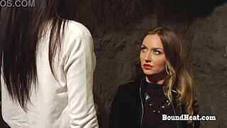 Lesbian slave takes massive strapon doggystyle!