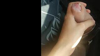 Watch this steamy handjob happening in the car.
