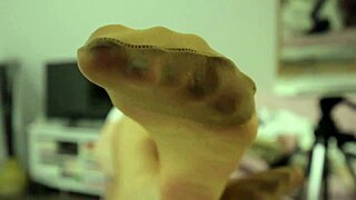 Girl plays balloons with pantyhose