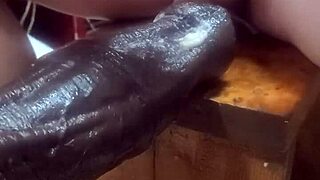 experimenting with huge dildos on the machine at home