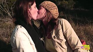outdoor picnic with two brunette friends turns into lesbian sex using strapon.
