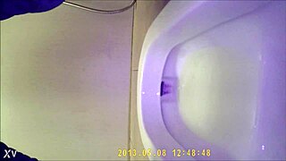 Asian teen pees hidden in toilet