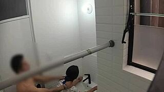 Hidden cam spies on cute teen in public bathroom.