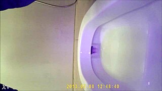 Asian teen pees hidden in toilet