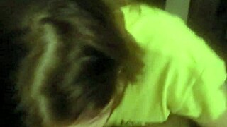 redhead slut deepthroats while lying on her belly