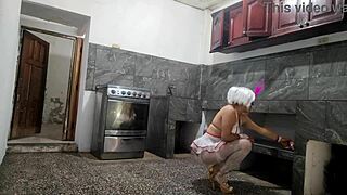 Mother-in-law dances seductively in brothel to attract clients for passionate sex.