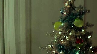 Two sexy brunettes explore the house at Christmas