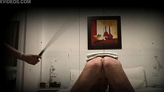 What do you think of this femdom session? She's dominating him hard!