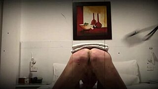 What do you think of this femdom session? She's dominating him hard!