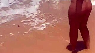 african beauty flashes boldly at the public beach today