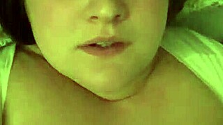 Moaning face caught in intense close-up moment