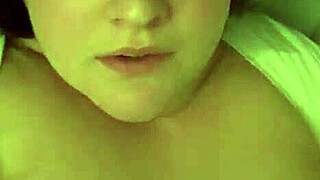 Moaning face caught in intense close-up moment