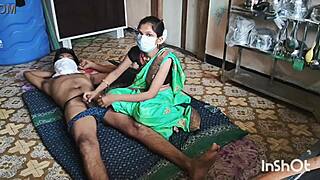 Village bhabhi Shivani stuns in green saree at a homemade gathering.