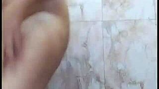 Young Indian beauty indulges in solo bathroom fingering with dirty talk.