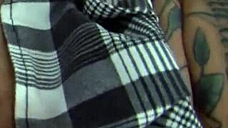 tattooed milf brunette craving big cock action?