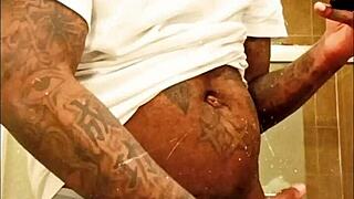 youngstarbrazy with tattoos warms up by sucking big black monster cock.