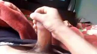 young woman masturbates in bed