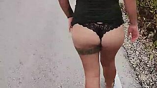 Mexican whore flashes her ass and natural tits on a public highway for all to see