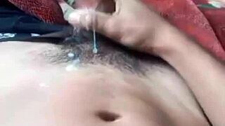 young woman masturbates in bed