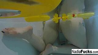 sexy nadia bathes with rubber duckies