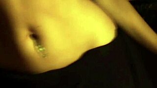 asian beauty teases with erotic dance in seductive indian setting