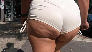 Walking in public with mini shorts, flashing ass for voyeurs.