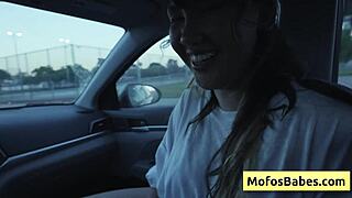 sexy asian hottie plays with natural big boobs in car