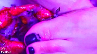 Bare toes crushing juicy fruit