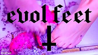 Bare toes crushing juicy fruit