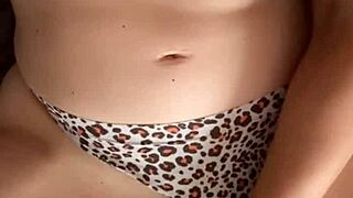 This milf is squirting while masturbating her huge tits