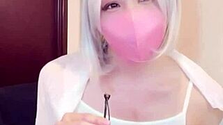 Masked beauty in crossdressing pleasures herself while streaming