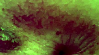 Tattooed woman teases her wet puffy pussy with toys.