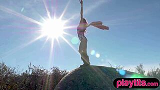 petite canadian milf strips outdoors, showing off her bubble butt in the fresh air.