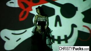Christy Mack as the pirate explores her body playfully.