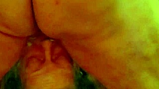 Mature woman practices deepthroat techniques enthusiastically.