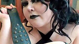 What dark secrets does this goth domina hide behind her whip?