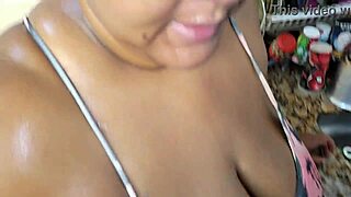 Stepmom takes huge cumshot on face in kitchen.