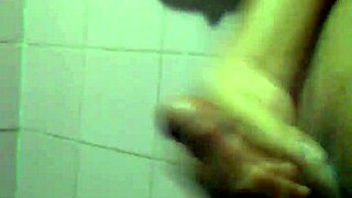 This young guy is casually jerking off in a solo masturbation session.