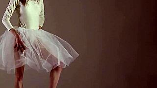 Blonde gymnast shows off acrobatic moves in the gym