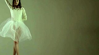 Blonde gymnast shows off acrobatic moves in the gym