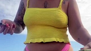 Wearing Bikini That Splits Pussy On Beach!